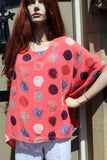 ladies gauzey cotton top with muted spots in coral