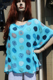 ladies gauzey cotton top with muted spots in turquoise