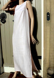 ladies sleeveless linen dress with long side slits in pale pink