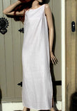 ladies sleeveless linen dress with long side slits in pale pink