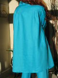 ladies loose linen shirt or jacket back view in turquoise